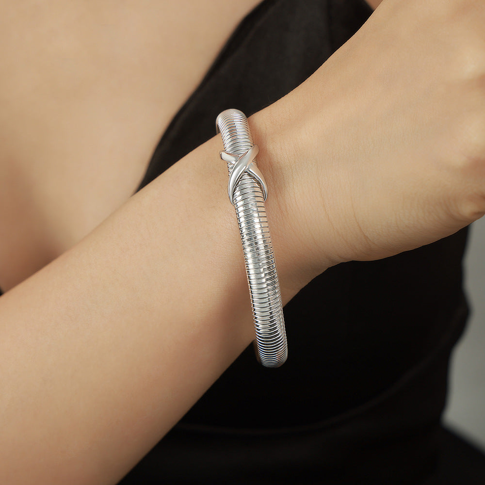 New personalized niche design sense fashionable versatile titanium steel plated 18K gold spring bracelet jewelry wholesale women