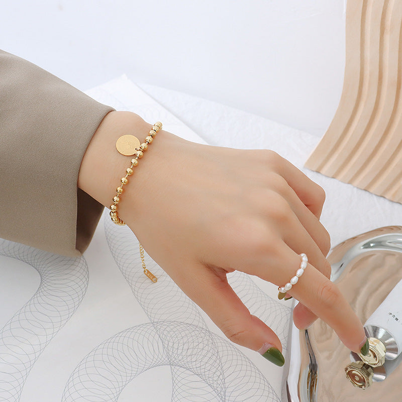 Retro court style geometric steel ball bracelet titanium steel plated 18K real gold light luxury trendy hand jewelry E053