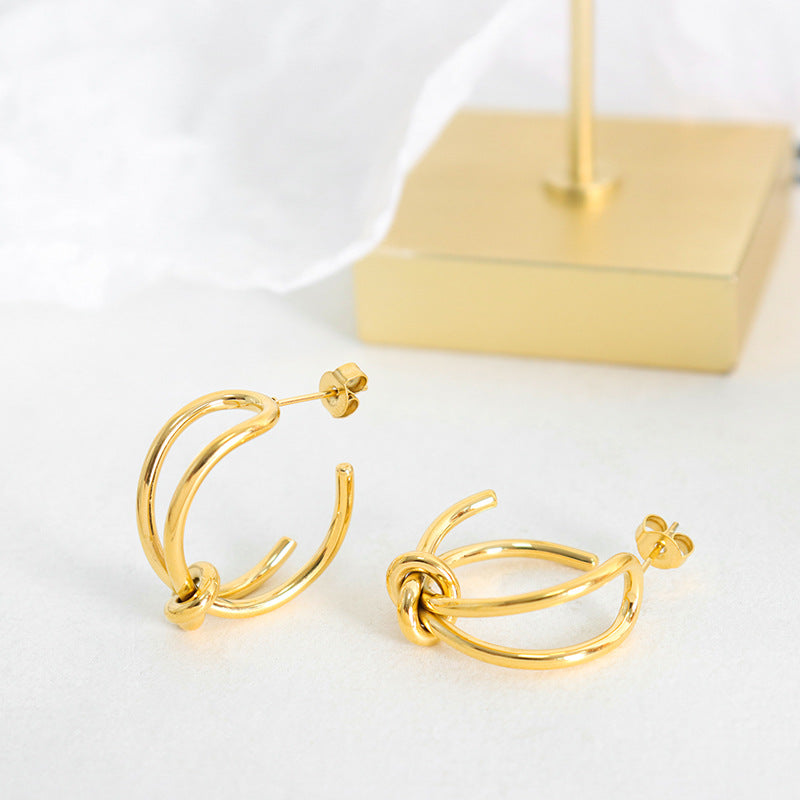 Unique creative personality niche design sense hot-selling rope knot earrings metal texture titanium steel gold-plated earrings pp
