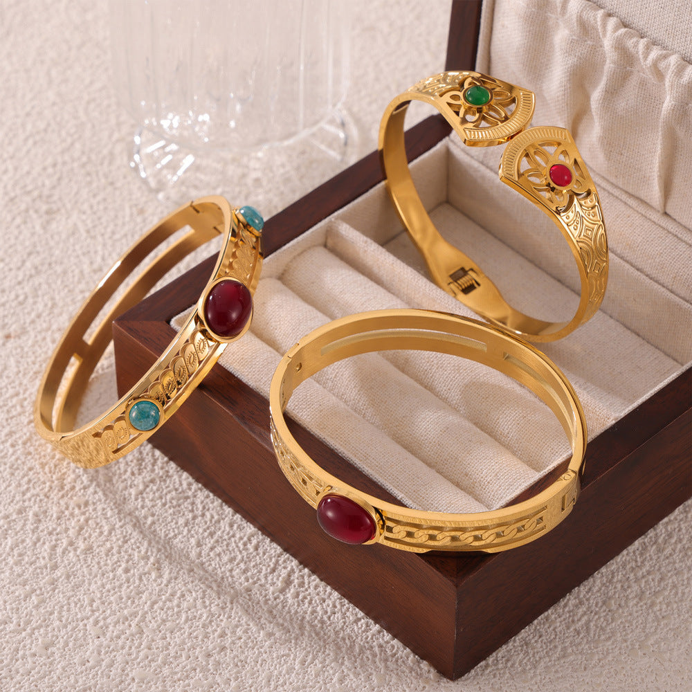 Hot-selling personality retro temperament elegant jewelry inlaid with natural stone design sense hollow titanium steel gold-plated bracelet pp