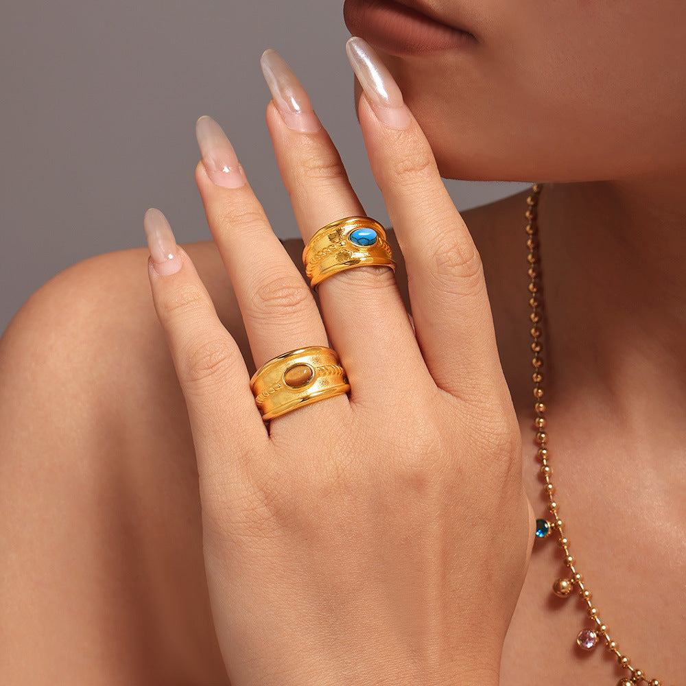 Stainless steel turquoise tiger's eye stone twist pattern ring women's PVD electroplated real gold color retention tail ring spot 99
