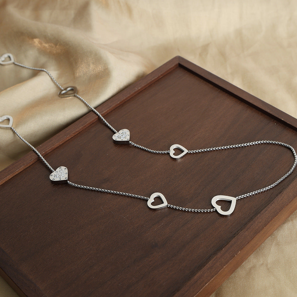 New high-end fashion versatile niche design titanium steel gold-plated double-layer love sweater chain necklace jewelry pp