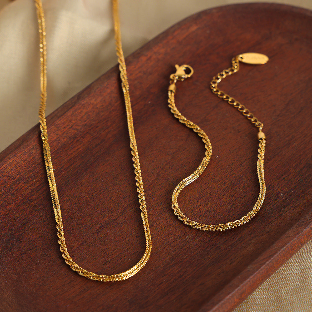 New personalized simple niche design titanium steel gold-plated texture twist necklace bracelet set jewelry female pp