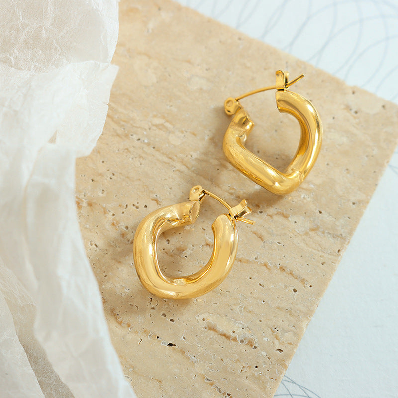 Marka style jewelry geometric twist special-shaped titanium steel plated 18k gold retro personality niche earrings