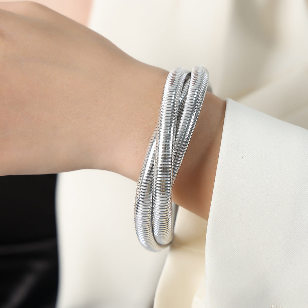 Hot-selling light luxury fashion gold-plated three-layer bracelet titanium steel serpentine winding elastic bracelet jewelry women 99