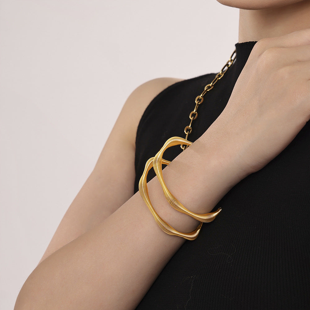 Temperament simple spiral pattern bracelet fashionable personality commuting versatile titanium steel bracelet women color retention spot wholesale