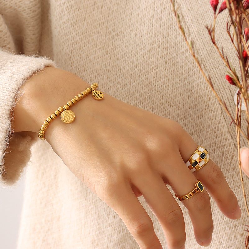 Fuxi bead bracelet women's gourd lucky bag elastic line bracelet titanium steel material gold-plated color-preserving jewelry women