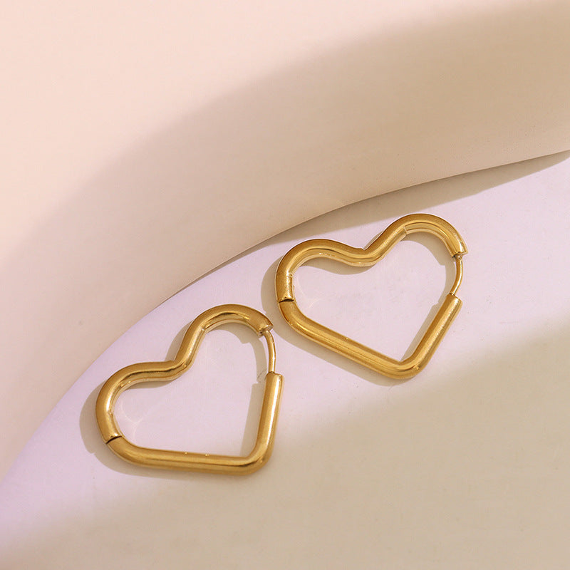 Plain circle niche versatile design titanium steel gold-plated earrings women's Korean trendy new ear jewelry spot 99