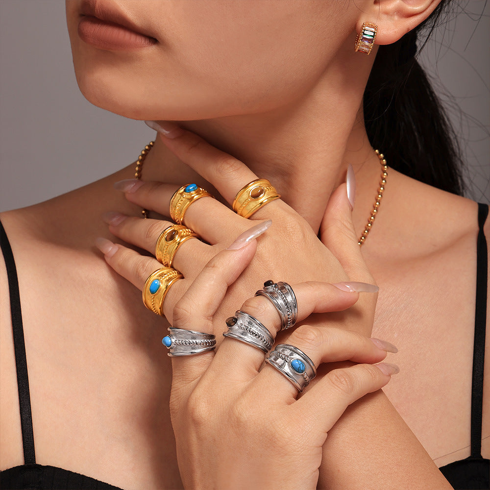 Stainless steel turquoise tiger's eye stone twist pattern ring women's PVD electroplated real gold color retention tail ring spot 99
