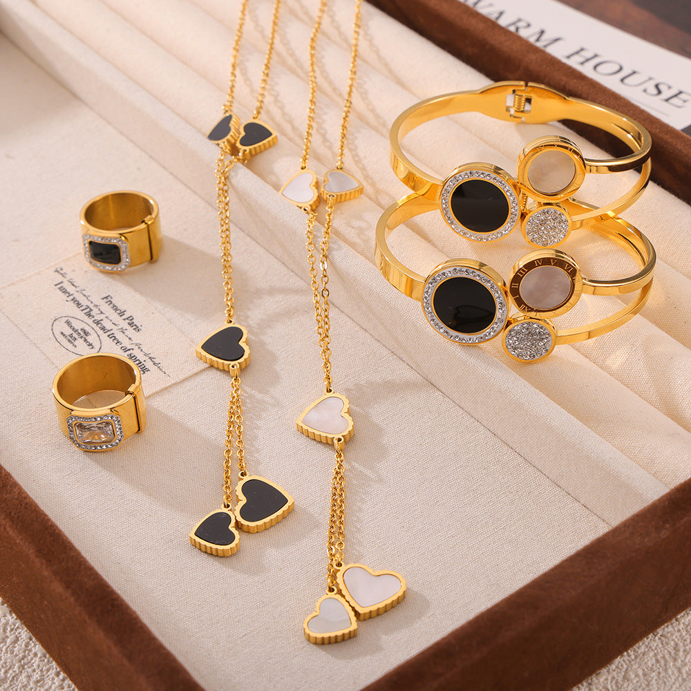 Temperament elegant light luxury zircon jewelry with diamond design sense Fritillary love titanium steel gold-plated jewelry set pp