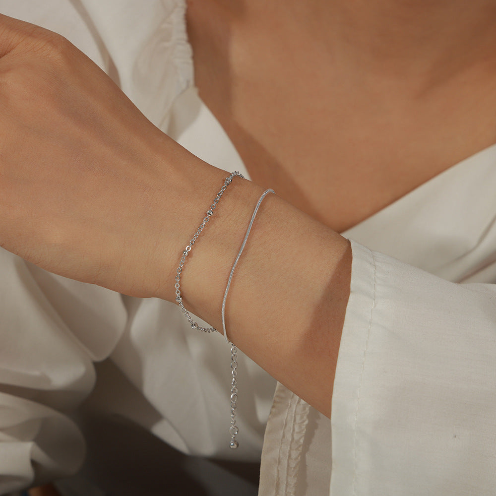New simple personality niche design titanium steel gold-plated lobster buckle double-layer bracelet jewelry wholesale