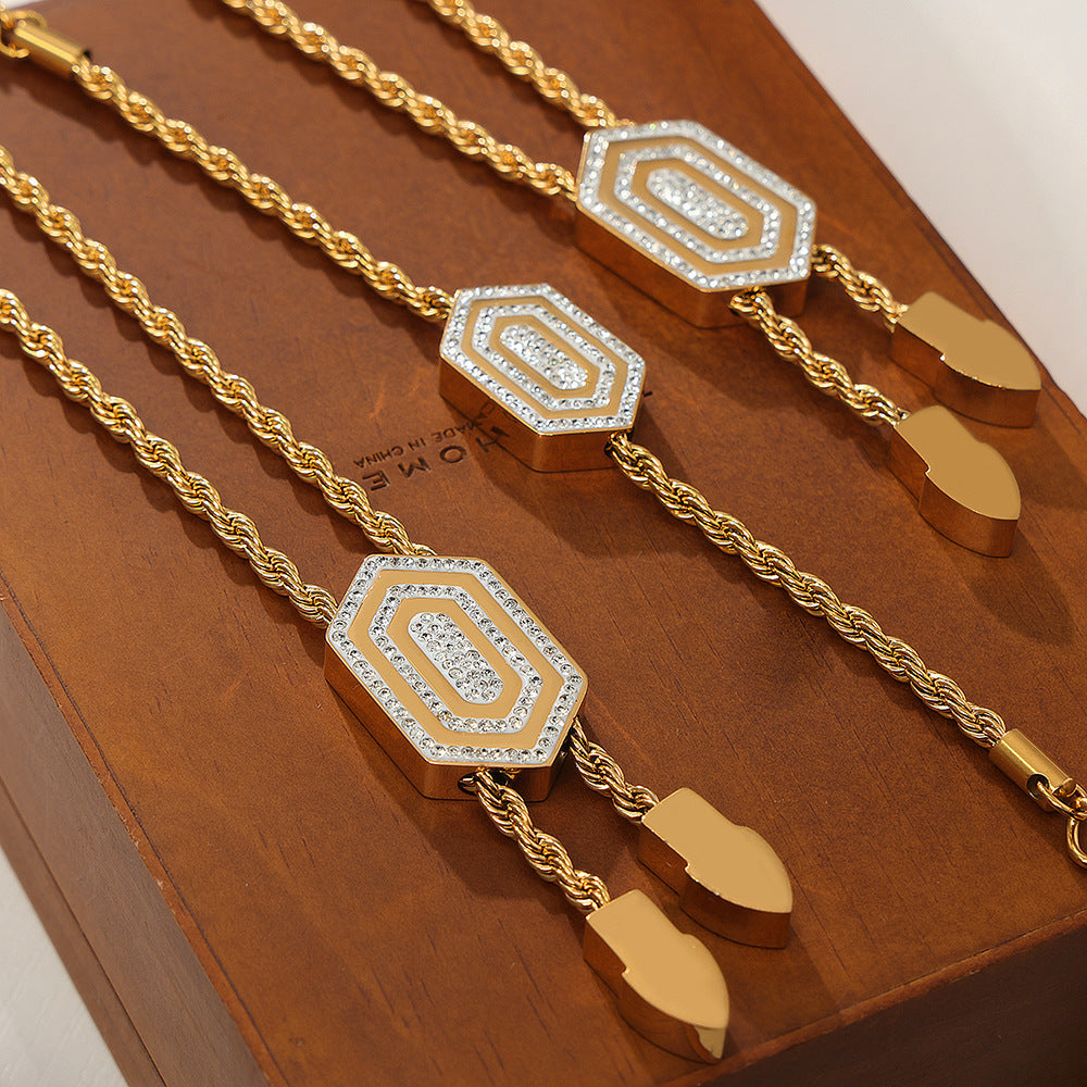 Simple and personalized light luxury wind titanium steel gold-plated hexagonal pendant with diamond pull-out buckle jewelry set for women