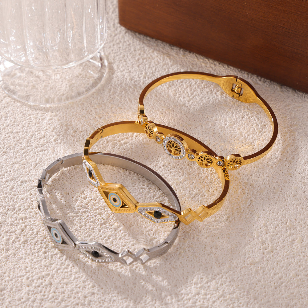 Hot-selling niche personalized hollow jewelry devil's eye tree of life diamond-encrusted design titanium steel gold-plated bracelet pp