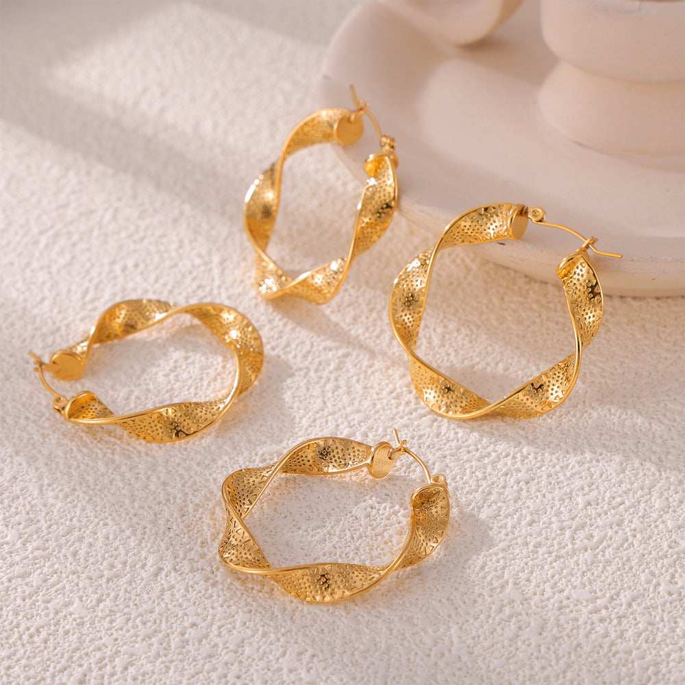 Personalized hip-hop style simple niche texture earrings ribbon twist design titanium steel gold-plated versatile earrings 99