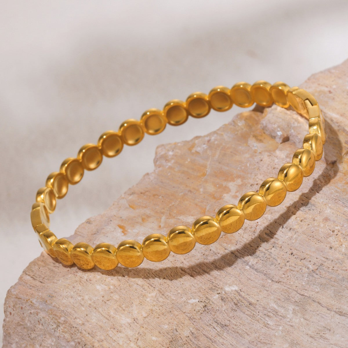 Golden bean dot buckle bracelet titanium steel electroplated 18K real gold does not fade spot factory wholesale