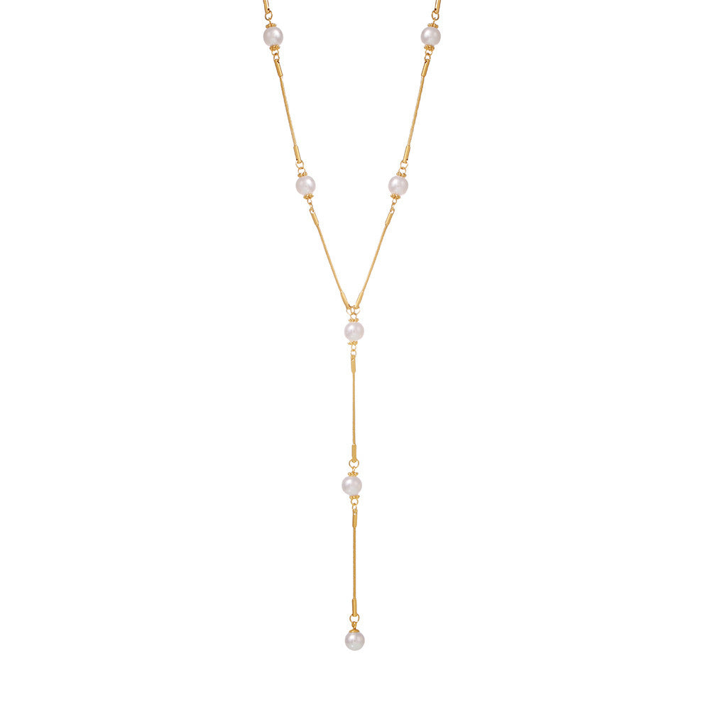 Stainless steel imitation pearl Y character autumn and winter clavicle sweater chain European and American light luxury fringed necklace spot pp