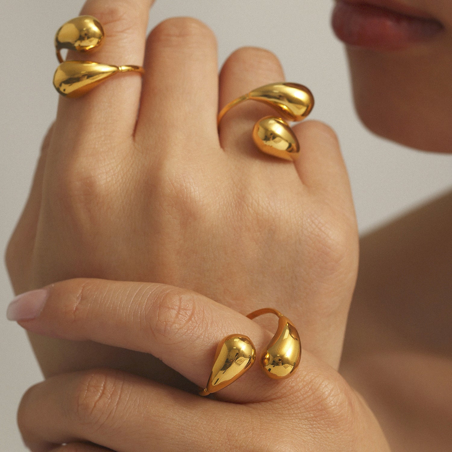 Stainless steel hollow opening comma water drop ring tail ring plated 18K real gold non-fading jewelry wholesale