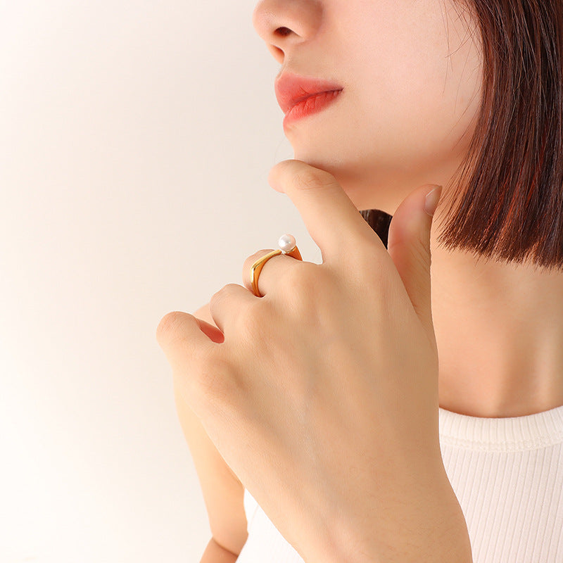 New jewelry retro style fashion temperament imitation pearl opening ring titanium steel gold-plated ring 99