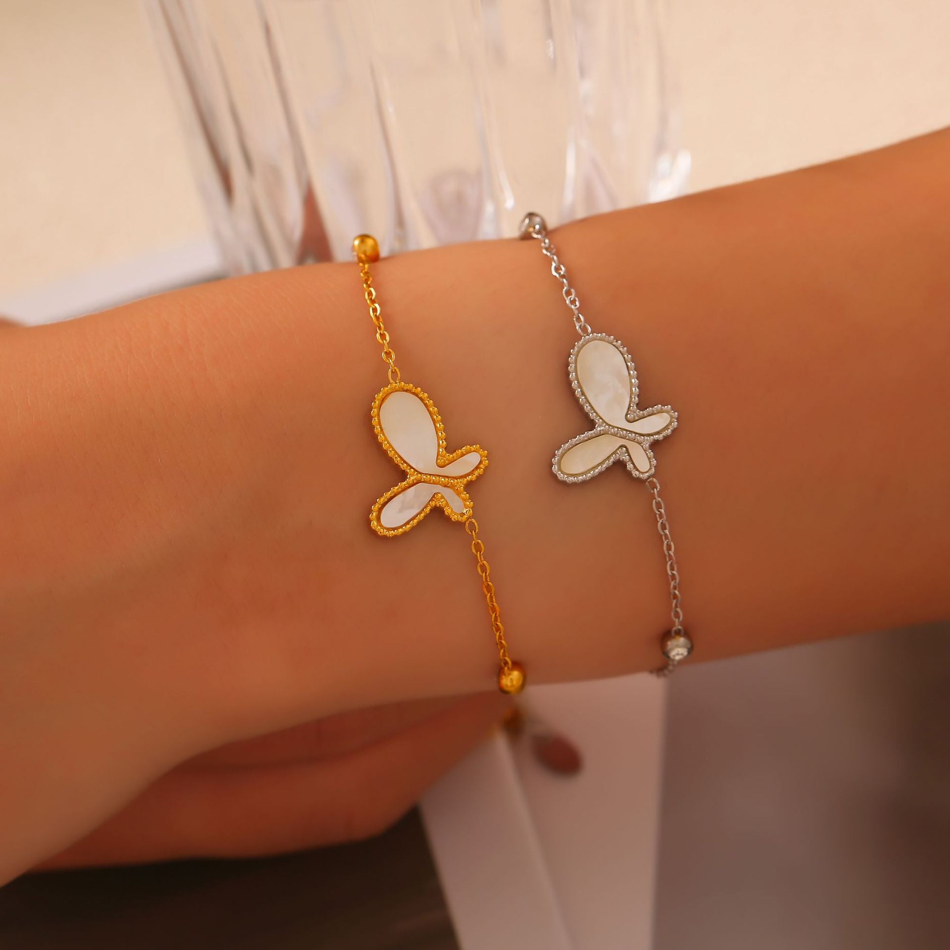 Elegant temperament gentle personality jewelry inlaid with white shell design butterfly pendant titanium steel gold-plated jewelry set
