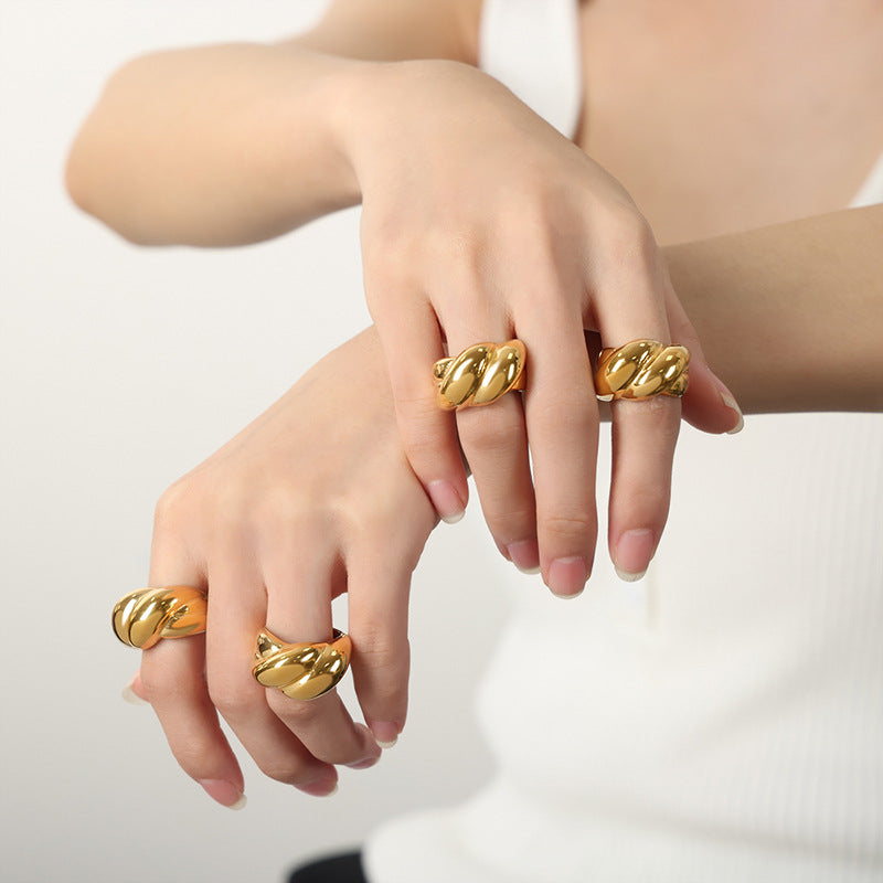 New niche design personality high sense titanium steel gold-plated fashion twist texture ring ring jewelry women