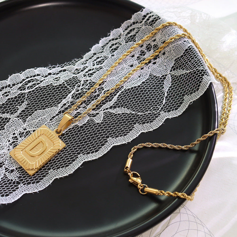 Cold wind niche light luxury retro high-end sense tag necklace titanium steel plated 18K real gold women's jewelry