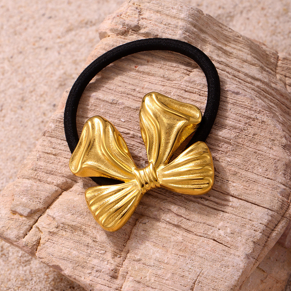Stainless steel bow hair rope plated with 18K real gold European and American exaggerated hair band ponytail elastic headrope hair accessories