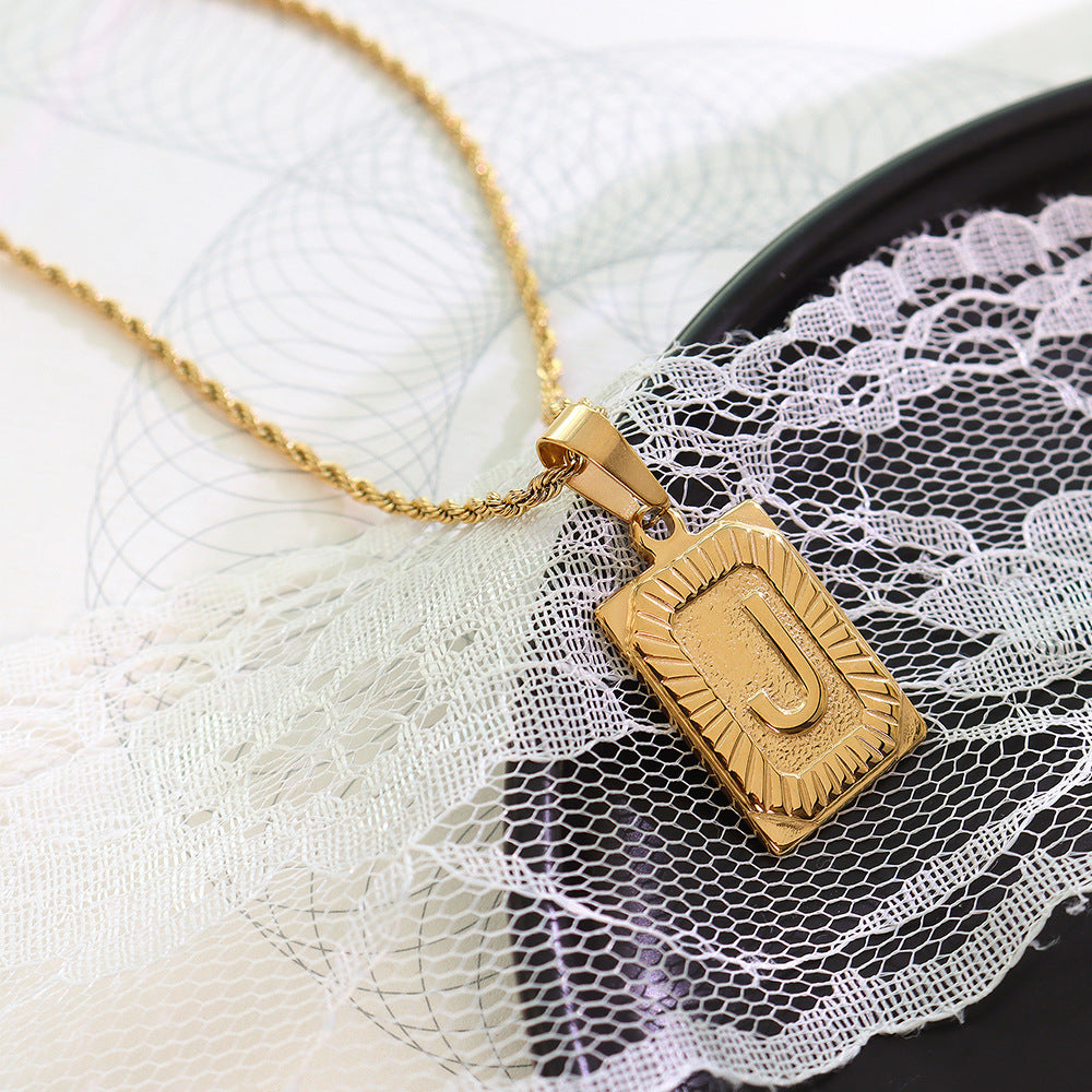 Cold wind niche light luxury retro high-end sense tag necklace titanium steel plated 18K real gold women's jewelry