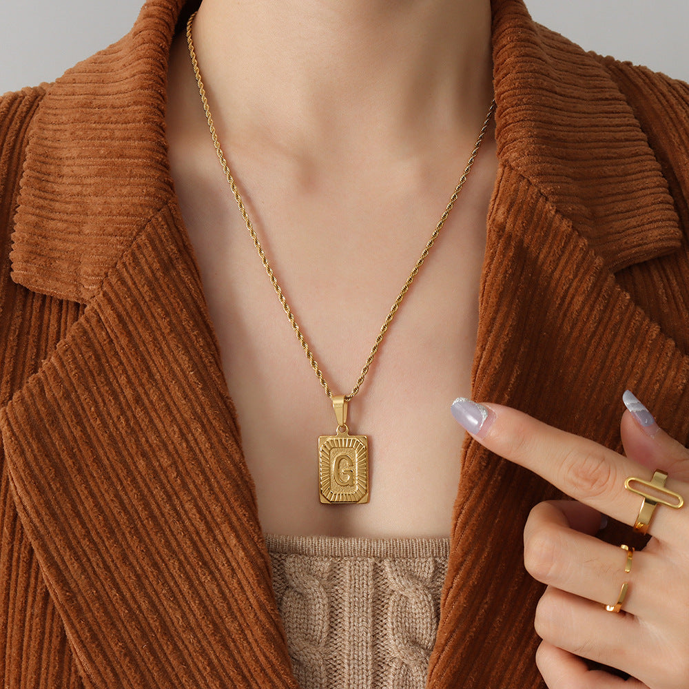 Cold wind niche light luxury retro high-end sense tag necklace titanium steel plated 18K real gold women's jewelry
