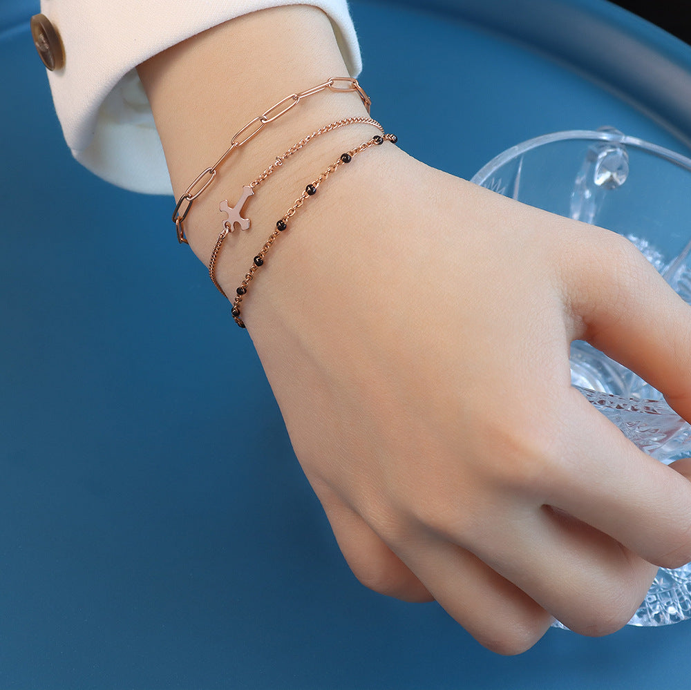 Premium light luxury three-layer stacked cross bracelet titanium steel 18k gold girlfriend jewelry women