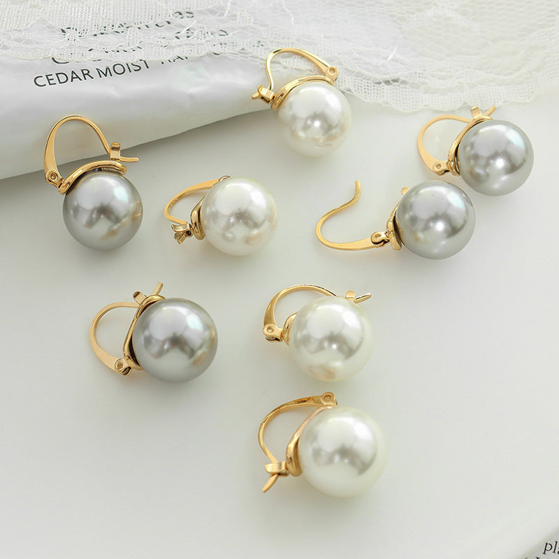 Cold wind light luxury exaggerated imitation pearl earrings women's titanium steel plated 18K real gold ear jewelry F36999