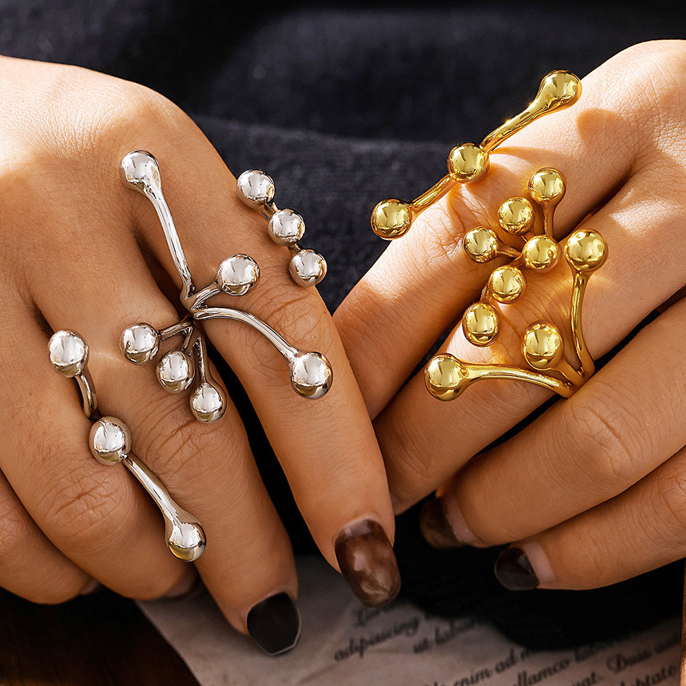 Ball casting ring Titanium steel water-plated 18K gold branch opening design creative exaggerated fashion ring spot