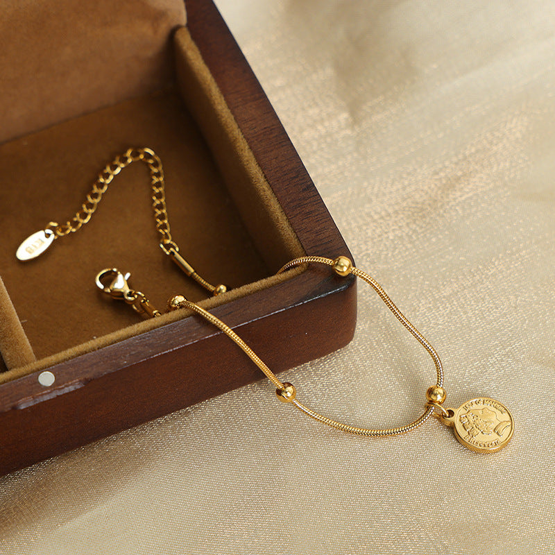 New fashion retro niche design titanium steel gold-plated cartoon face round brand pendant bracelet jewelry female pp