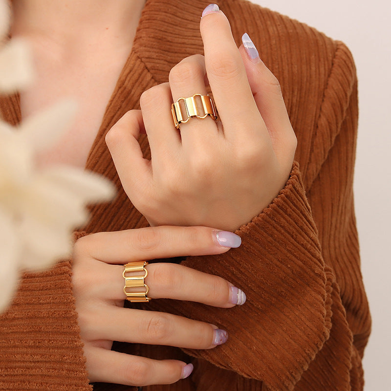 Cold wind light luxury hollow geometric ring necklace bracelet combination titanium steel plated 18K real gold set