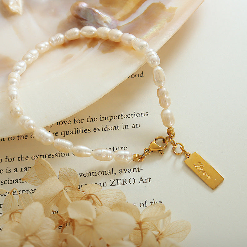Titanium steel plated 18K gold English letter square pendant medium antique temperament freshwater pearl bracelet bracelet 99