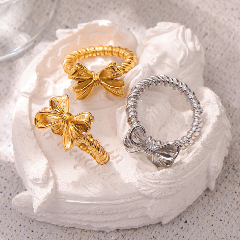 Stylish and simple personalized bow design ring geometric twist ring titanium steel gold-plated versatile index finger ring