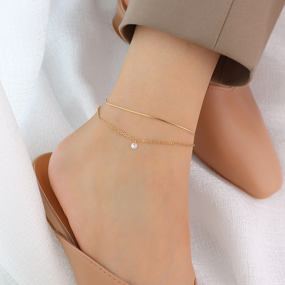 Cold wind light luxury personality double-layer simple niche inlaid zircon titanium steel plated 18k gold foot decoration