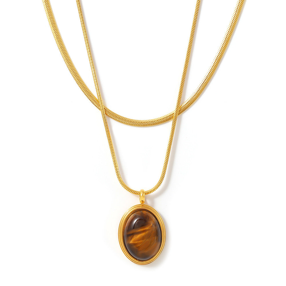 Autumn and winter stacked wearing Maillard style oval tiger's eye stone pendant necklace light luxury stainless steel non-fading neck chain