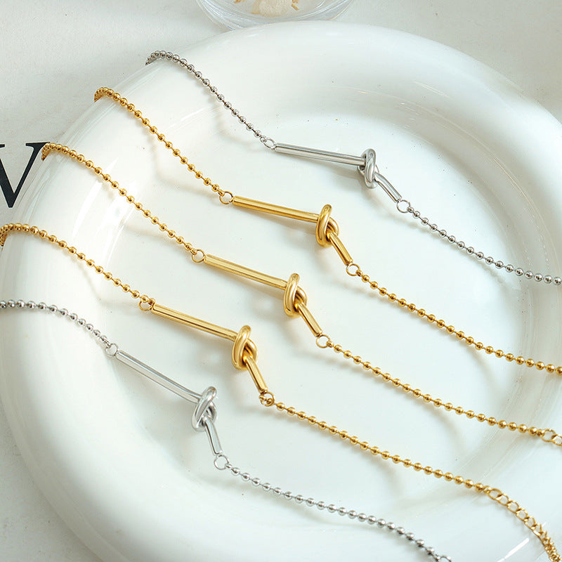 Small lucky heart-shaped knotted bead chain mini bracelet female girlfriend personality trendy titanium steel plated 18k gold niche hand jewelry