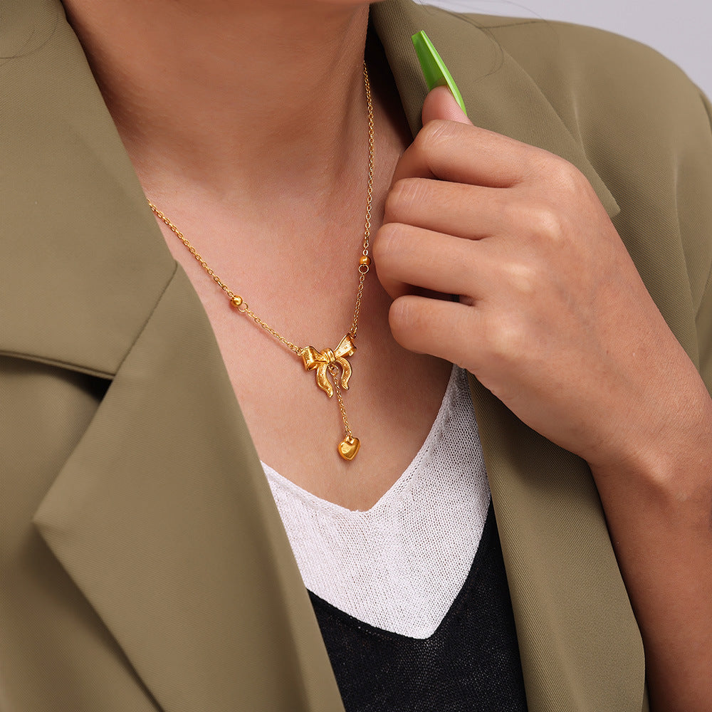 Chic wind love fringed bow collarbone necklace sweet wind women's necklace titanium steel plated 18k real gold