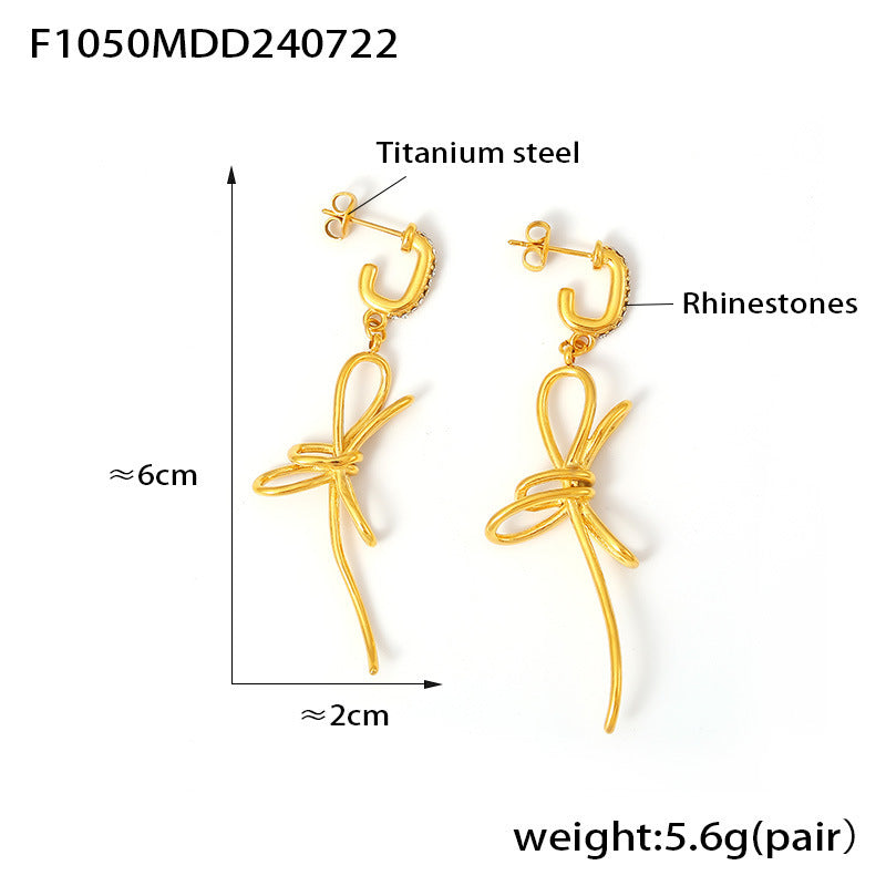 Light luxury bow tassel ribbon stud earrings stainless steel plated 18K real gold fairy earrings spot wholesale