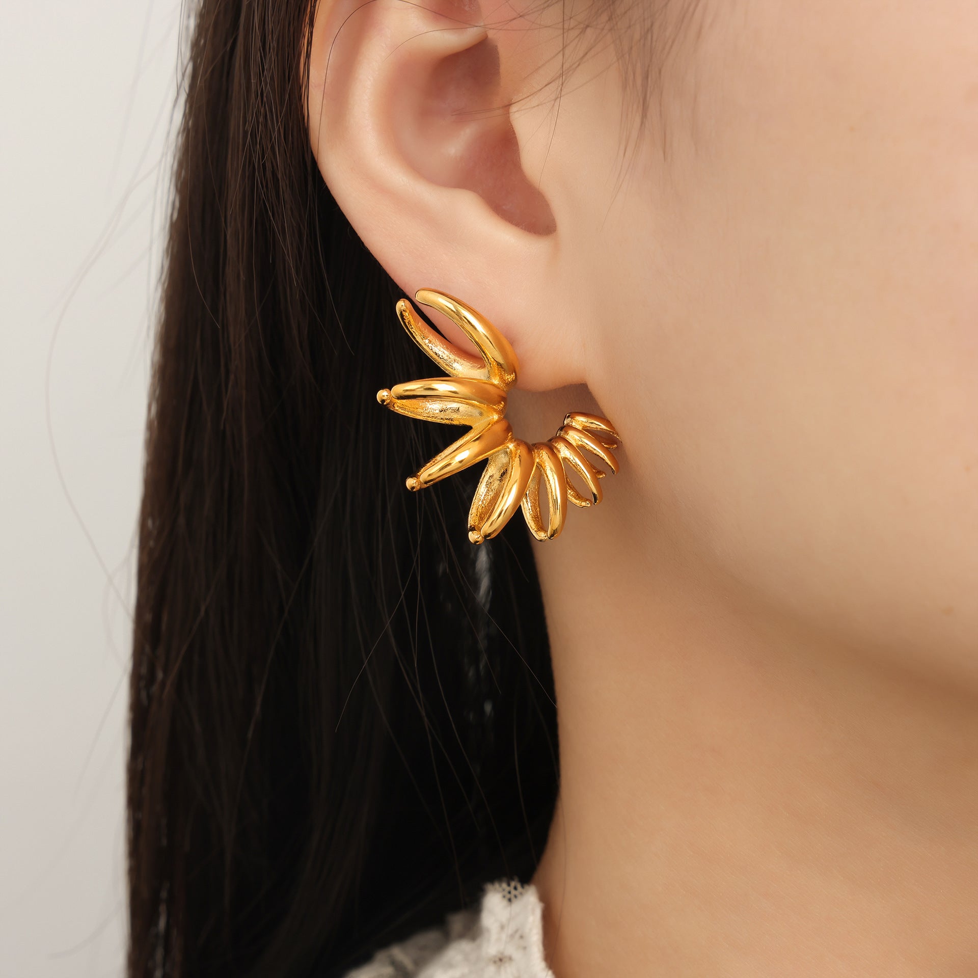New personalized niche design irregular titanium steel gold-plated fashion creative petal earrings jewelry wholesale women
