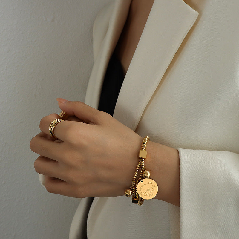 Retro titanium steel bracelet, plated with 18K gold steel ball love round brand elastic line double-layer stacked bracelet hand jewelry