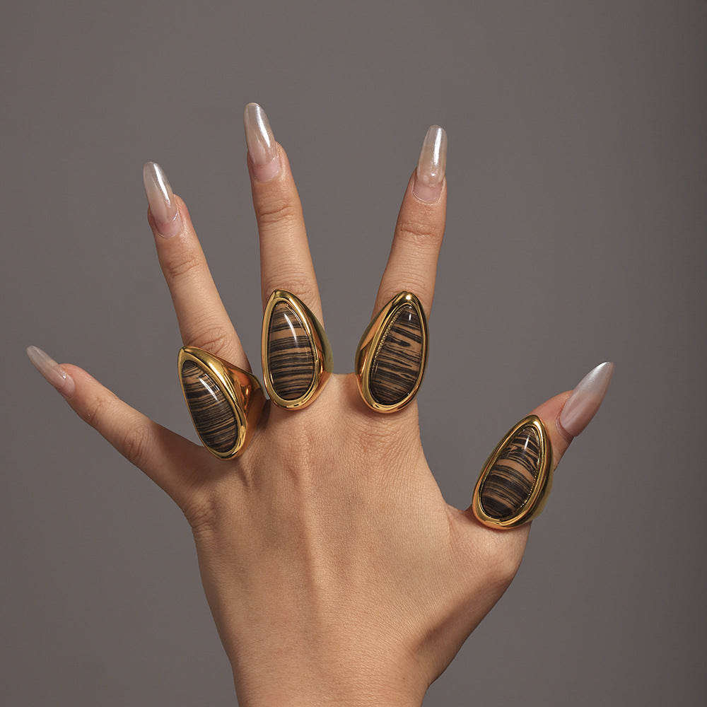 Natural wood grain stone water drop ring plated with 18K real gold Maillard autumn and winter light luxury ring ring decoration is in stock.