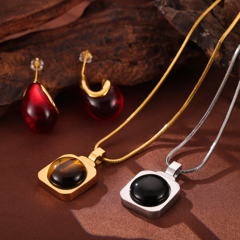 Hot-selling personalized light luxury jewelry inlaid with tiger's eye design titanium steel jewelry set pp