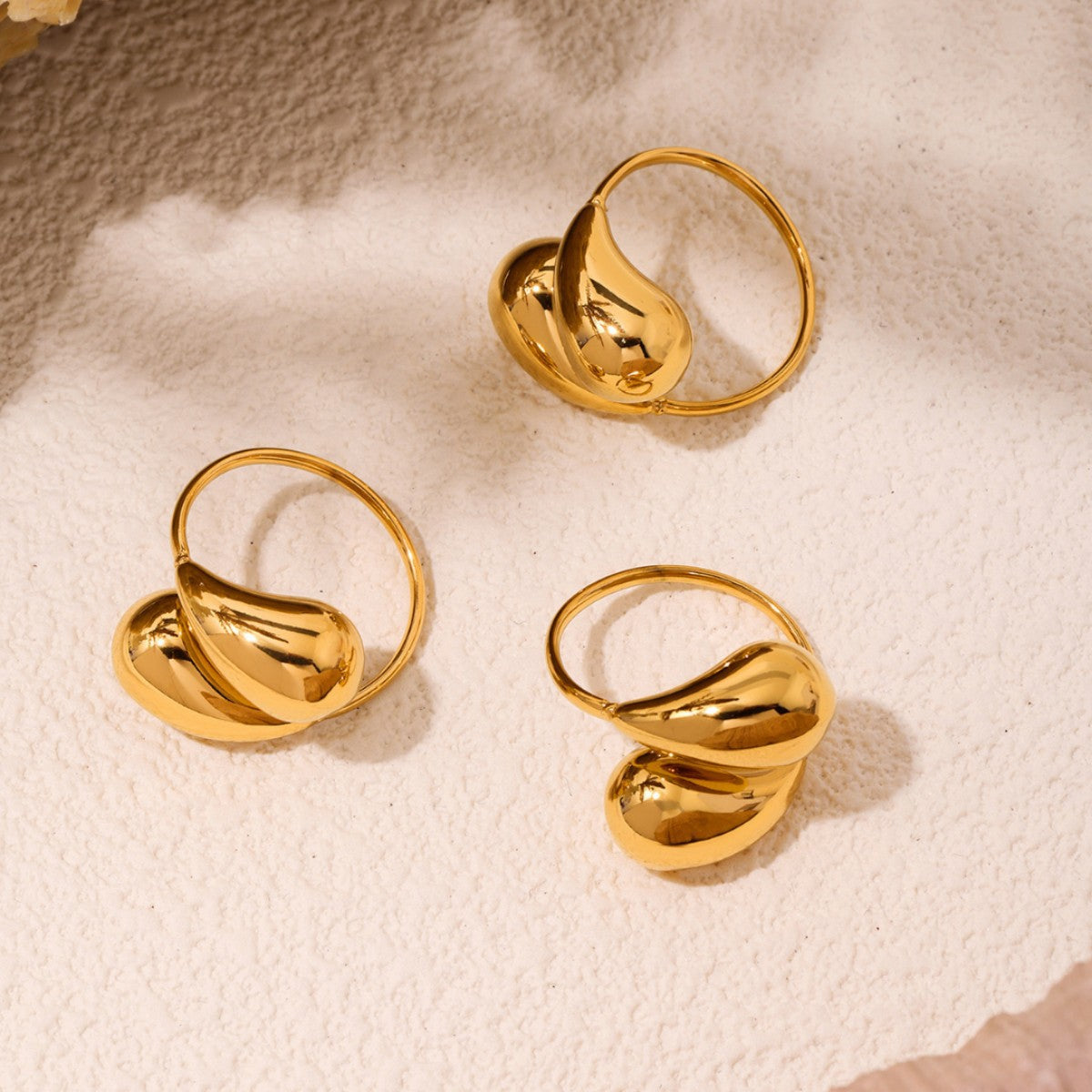 Stainless steel hollow opening comma water drop ring tail ring plated 18K real gold non-fading jewelry wholesale