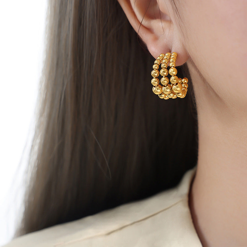 C-shaped semicircular three-layer steel ball splicing niche design metal texture fashionable personalized titanium steel plated K gold earrings