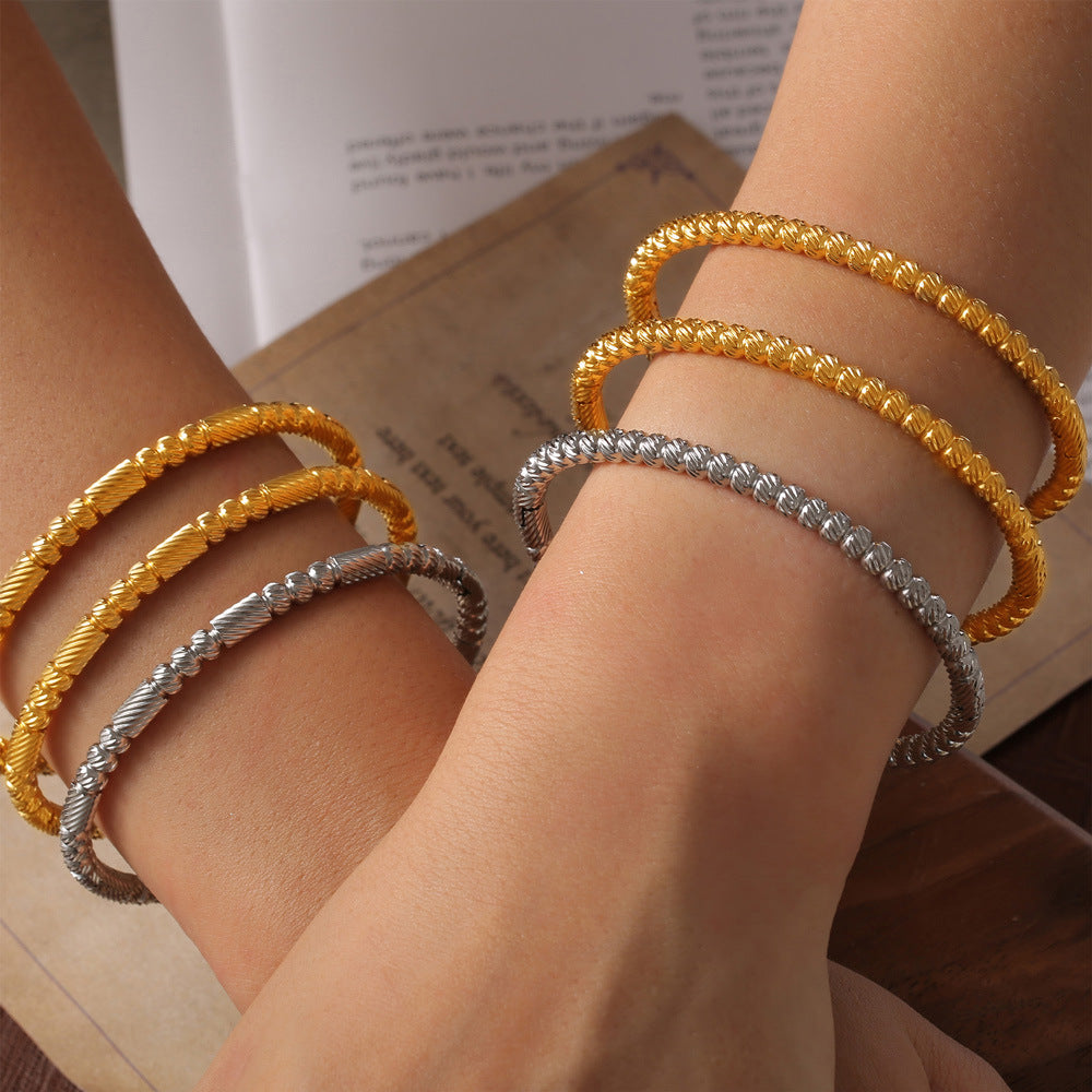Fashion commuter personality minimalist elegant jewelry geometric texture round bead splicing design titanium steel gold-plated bracelet pp