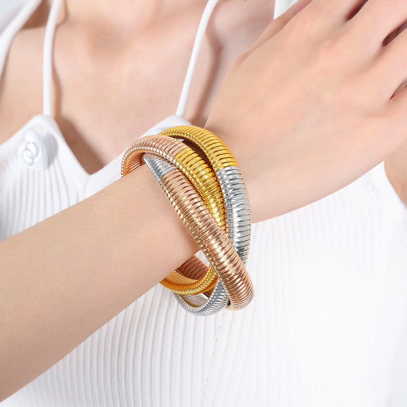 Hot-selling light luxury fashion gold-plated three-layer bracelet titanium steel serpentine winding elastic bracelet jewelry women 99