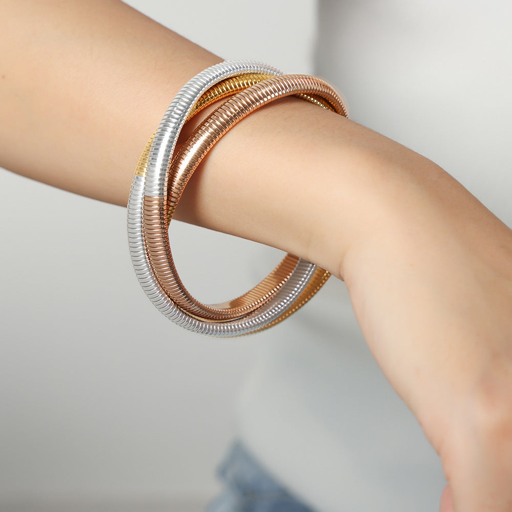 Hot-selling light luxury fashion gold-plated three-layer bracelet titanium steel serpentine winding elastic bracelet jewelry women 99