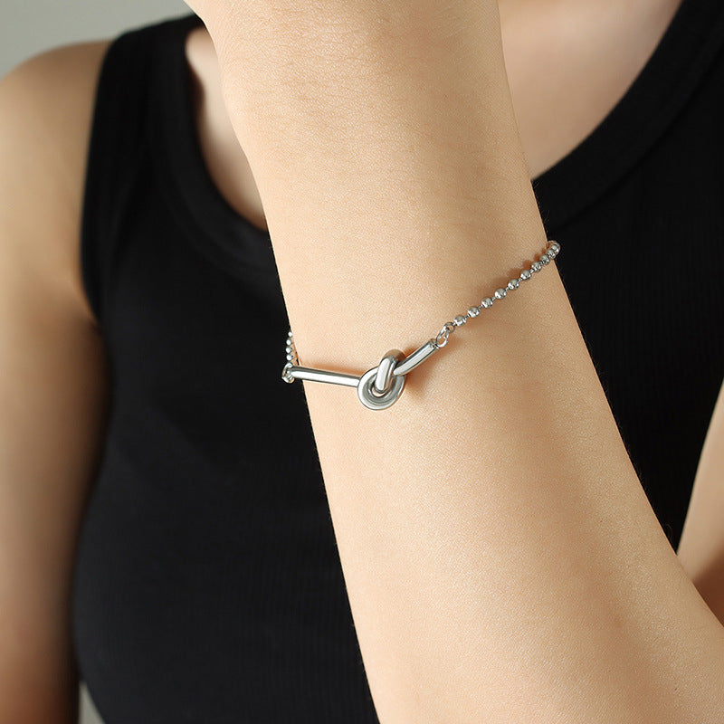 Small lucky heart-shaped knotted bead chain mini bracelet female girlfriend personality trendy titanium steel plated 18k gold niche hand jewelry